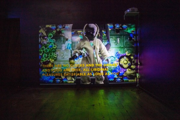 A projection in a dark room.